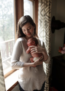 Mom and newborn at newborn photoshoot, boulder, colorado