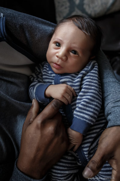 Westminster, CO newborn photographer, grandpa holding baby